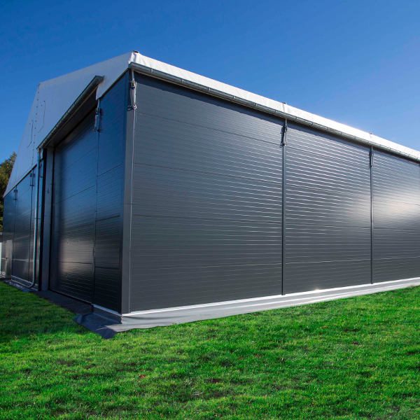 découvrez notre hangar agricole durable, conçu pour résister aux intempéries tout en minimisant l'impact environnemental. idéal pour stocker vos équipements et récoltes, il allie fonctionnalité et respect des ressources naturelles.